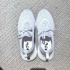 Brand new white sneakers by APL